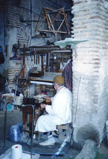 le tisserand dans son échoppe